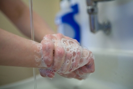 person washing hands