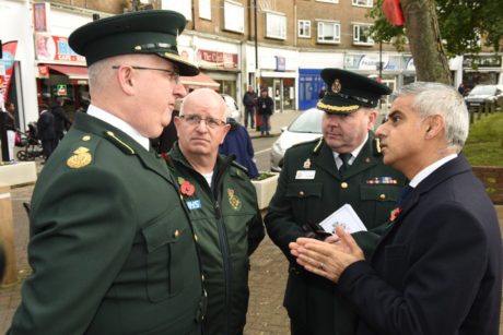 Paul Gates, Consultant Paramedic, Terry Healy, Paramedic Team Leader, and Liam Lehane, Assistant Director of Operations, speak to Mayor Sadiq Khan at the memorial