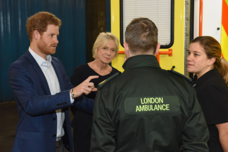 Prince harry with cycle response paramedic Susanna Trow and Assistant Director of Operations Peter Rhodes