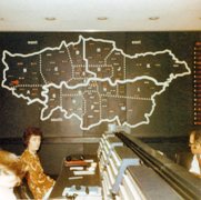 old image of control room with map of London in background