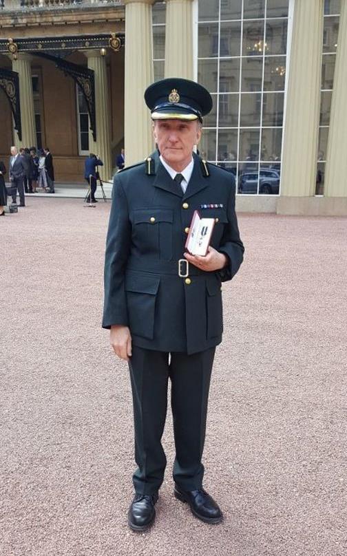 Paul Smith receives the Queen's Ambulance Service Medal