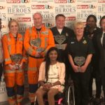 Thusha and her family with the medics who saved her at the NHS Heroes Awards