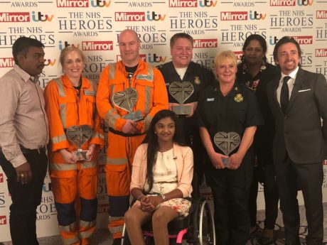 Thusha and her family with the medics who saved her at the NHS Heroes Awards
