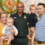 Emergency Medical Dispatcher Dean with Jemima and her family