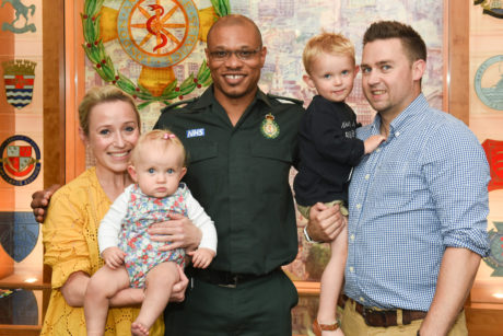 Emergency Medical Dispatcher Dean with Jemima and her family