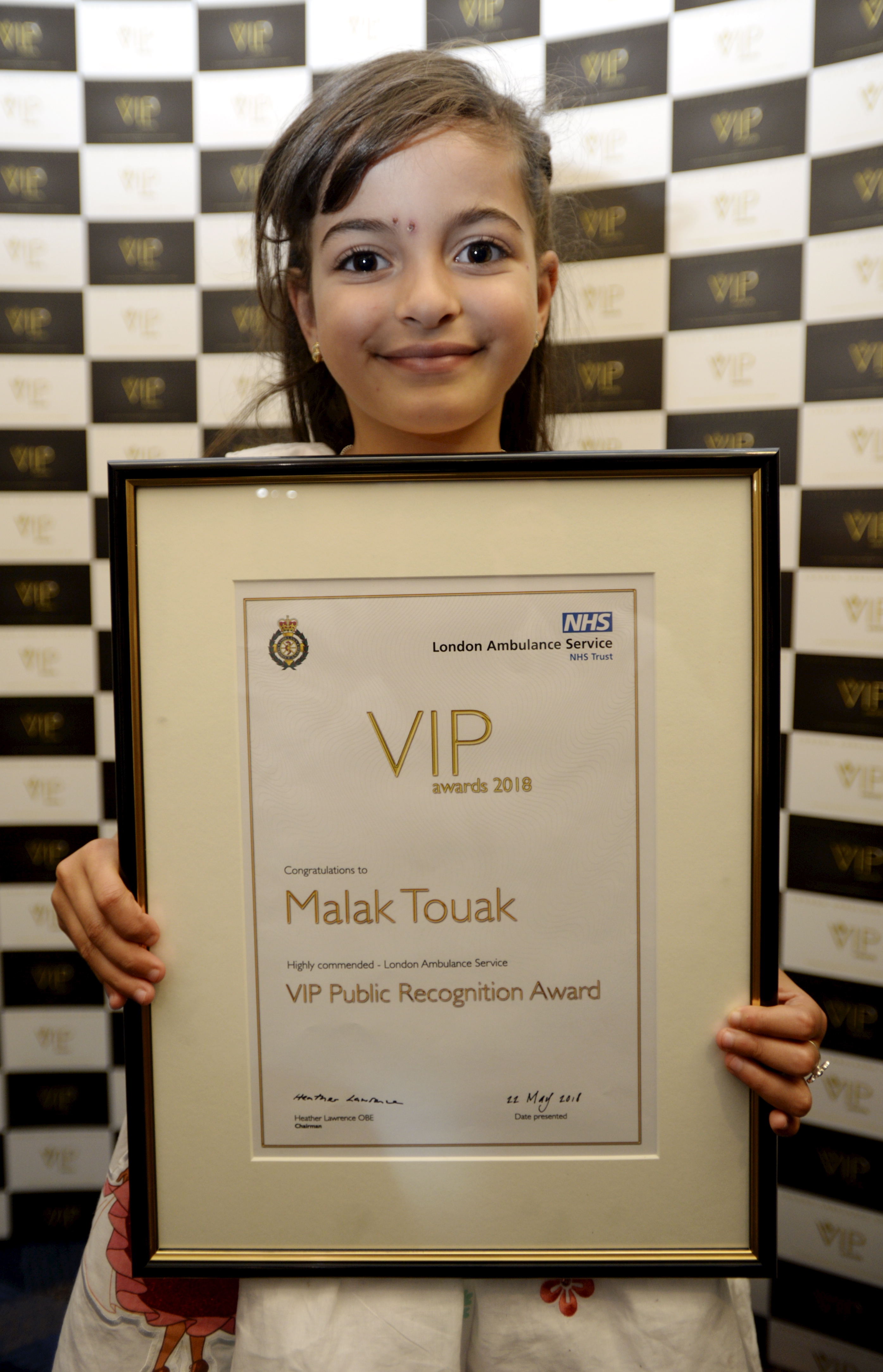 Malak with her award