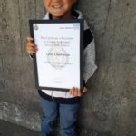 Tyler Lawrence with his certificate