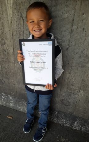 Tyler Lawrence with his certificate