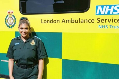 Hina stood in LAS uniform in front of an ambulance