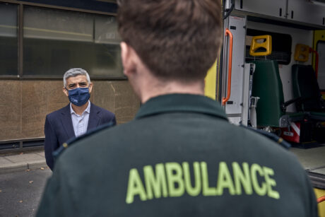 Mayor talking to LAS medic in green uniform who is stood facing him