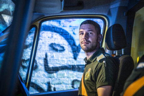 Stuart in an ambulance cab