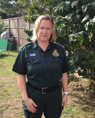 Tracy in her LAS uniform in a garden