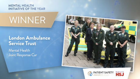 Graphic displaying mental health team as winners of their award category and an image of the team next to an ambulance car