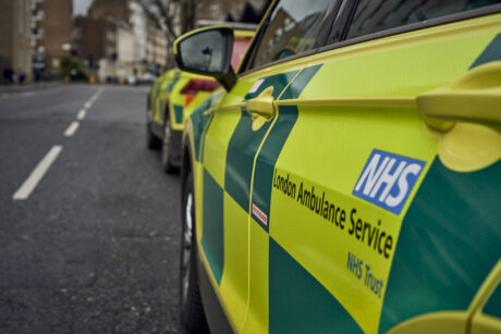 the side door of an ambulance car with the LAS logo visible