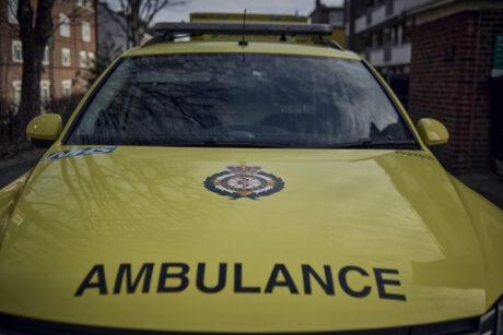 The bonnet of an ambulance car with the LAS logo and the word ambulance