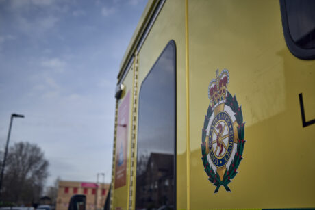 A stock image of the LAS logo on the side of an ambulance