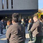 Colleagues gathered in our headquarters memorial garden to observe a silence