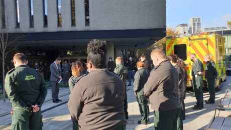 Colleagues gathered in our headquarters memorial garden to observe a silence