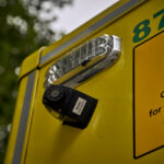 A CCTV camera on the side of an ambulance