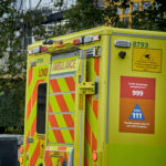 A CCTV camera on the side of an ambulance