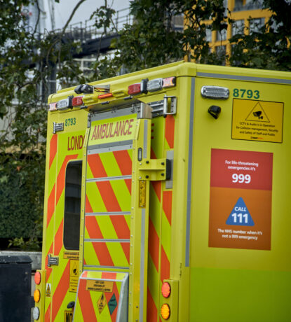 A CCTV camera on the side of an ambulance