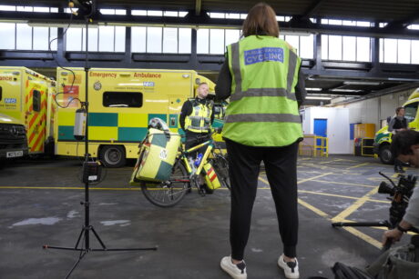 A cycle medic seen being interviewed by a journalist