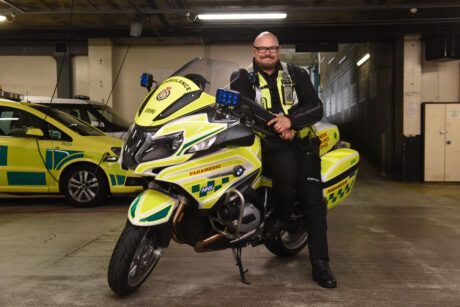 Richard, interim head of MRU with his motorcycle in ambulance livery
