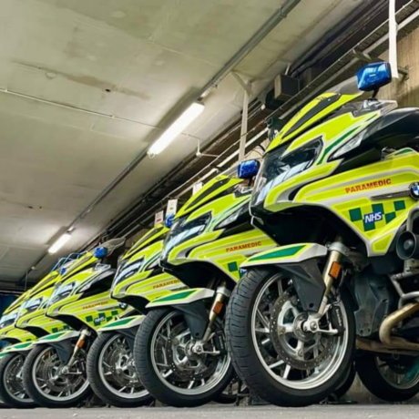 A row of motorcycles in ambulance livery