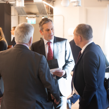 LAS Chief Executive Daniel Elkeles at the event in conversation with two men