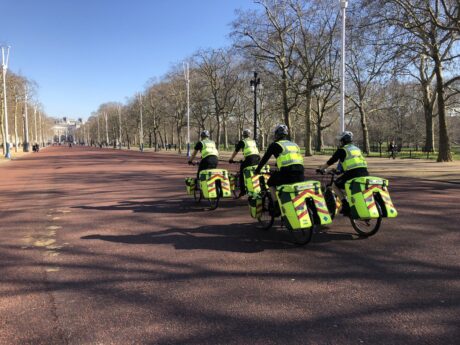 A group of cycle paramedics cycling along The Mall