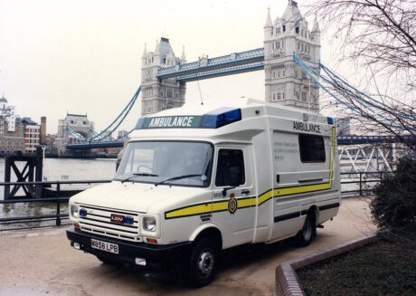 A white LDV ambulance parked with Tower Bridge in background