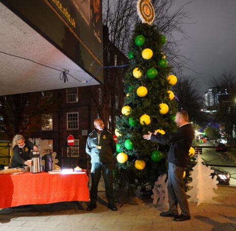 John standing smiling next to the Christmas tree with LAS EO Daniel Elkeles just prior to switching on the lights