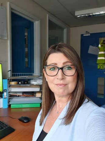 Kay pictured at her desk