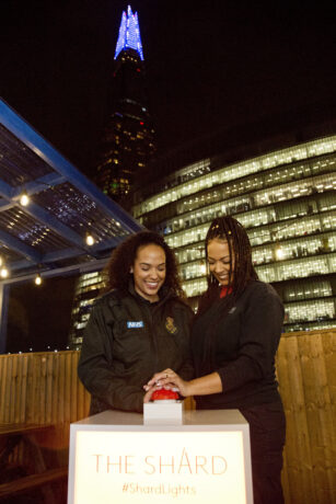 Siobhan and Shivaun smiling as they prepare to switch the lights on