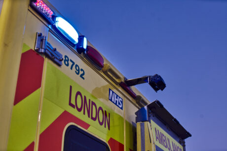 Stock image of the read door and rear blue light bar on an ambulance