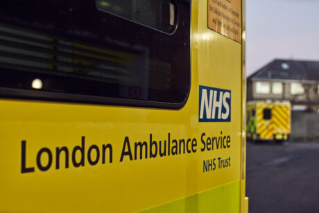 Photo of the side of an ambulance with the words London Ambulance Service