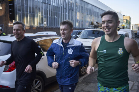 LAS CEO Daniel Elkeles, North West Ambulance CEO Daren Mochrie and Tim photographed running together