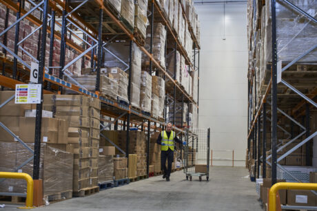 A staff member working in our large logistics warehouse