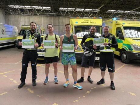 The runners and their cycle paramedic chaperones photographed just after finishing their challenge back at Camden ambulance station