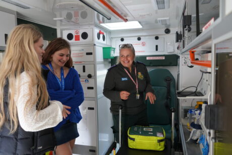 Michelle shows Gemma and Nicole the inside of an ambulance