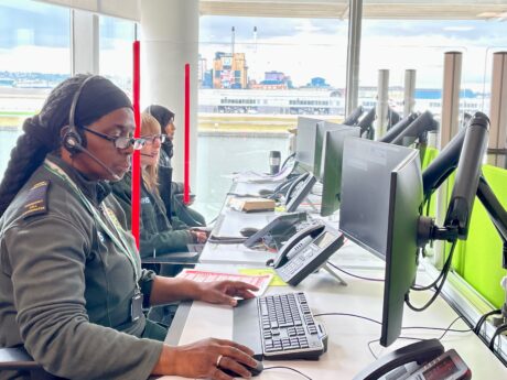 999 call handler Maureen sat at her desk in the new EOC, with two more call handlers along the desk in the background