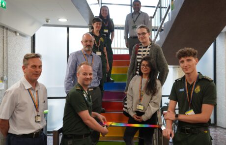 Co-Chair of our LGBT network Alex Ewings with CEO Daniel Elkeles and other staff to unveil Pride stairs.