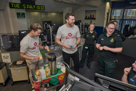 Aj and Curtis with the tea trolley visiting the 999 control centre.