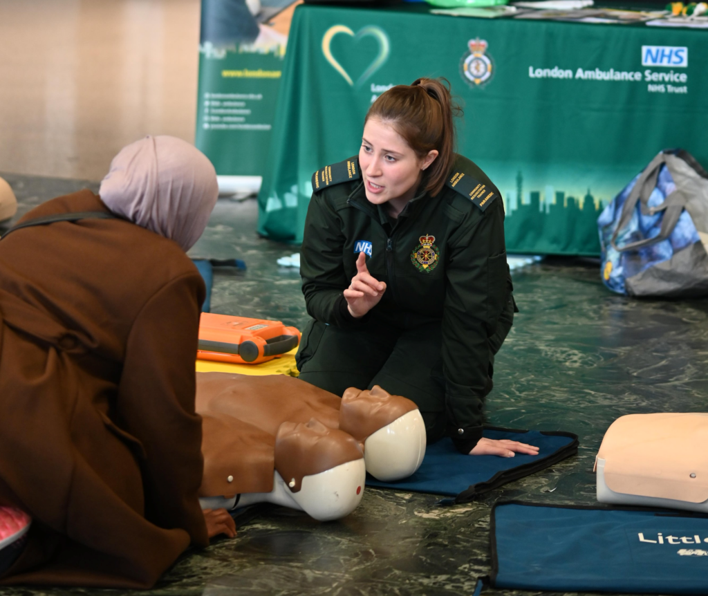 A picture of Millie, one of our trainers, teaching a member of the public how to 