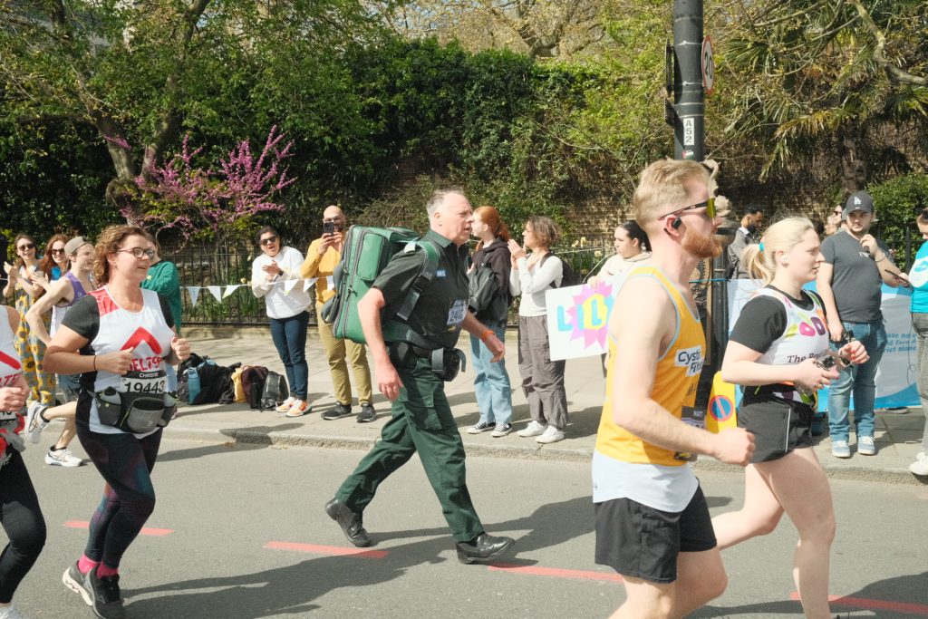 Emergency Responder Chris running the London Landmarks Half Marathon in his full London Ambulance Service uniform and 13kg response bag.