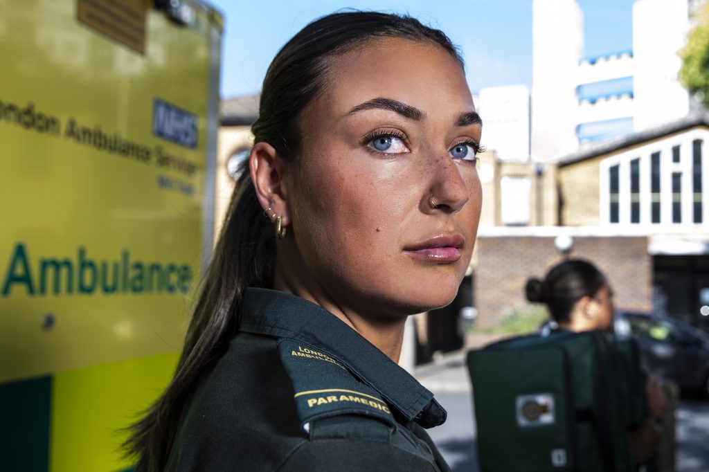 Astrid and Lydia in their ambulance uniforms responding to life-threatening emergencies. 
