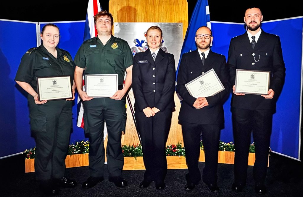 Liz and Alex (left) receive a special Metropolitan Police Service commendation for their actions