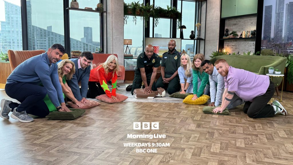 Kez and Omar with BBC Morning Live guests performing CPR training. 