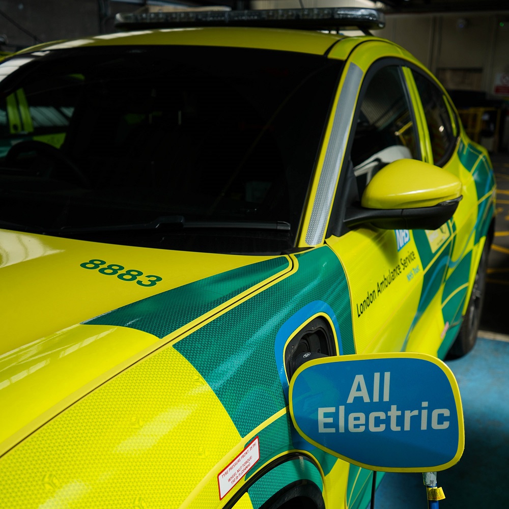 A London Ambulance Service fast-response car using an electric charging point. 