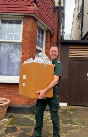 LAS paramedic Nigel Flanagan collects gifts for Op Christmas Present